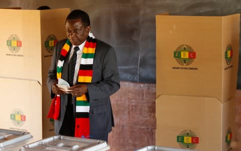 Emmerson Mnangagwa cast his ballot in Kwekwe, 100 miles southwest of Harare - Credit: Xinhua / Barcroft Images