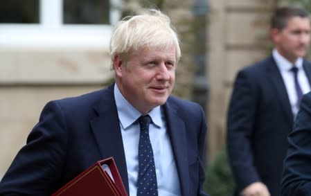 British Prime Minister Boris Johnson leaves after his meeting with Luxembourg's prime minister