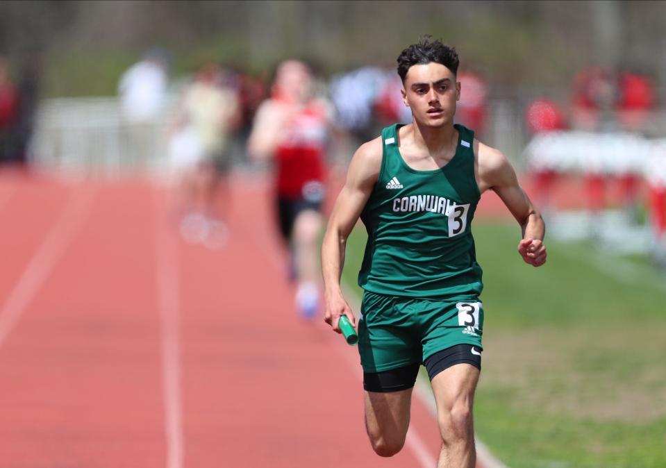 Cornwall's MarcSean Montero runs leg of the bohs 4x200-meter relay during day 2 of the Red Raider Relays at North Rockland High School in Thiells on Saturday, April 23, 2022. His team captured the 4x200 in 1:30.83.
