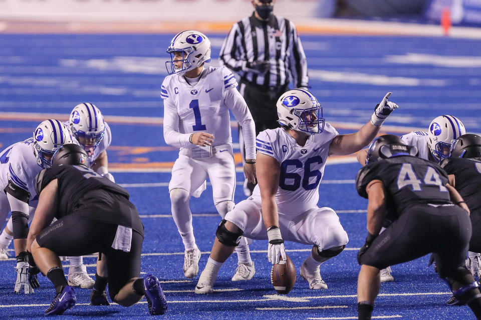 BYU quarterback Zach Wilson and offensive lineman James Empey call out signals during a game against Boise State on Nov. 6. (Loren Orr/Getty Images)