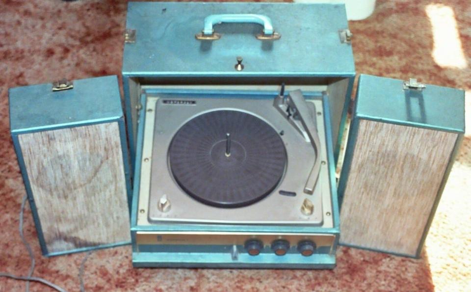 Portable turntable with built-in speakers, circa 1960s.