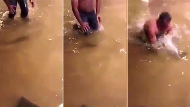 Watch Man Catches Fish With Bare Hands