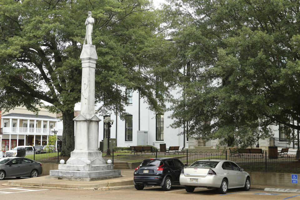 The Confederate soldier's monument rests outside the old county courthouse on the town square in Oxford, Miss., July 22, 2020. The monument has been there since 1907. However, protests against racial injustice across the nation in the past three months have brought renewed debate about the display and or possible relocation of the Confederate monument. (Adam Robison/The Northeast Mississippi Daily Journal via AP)