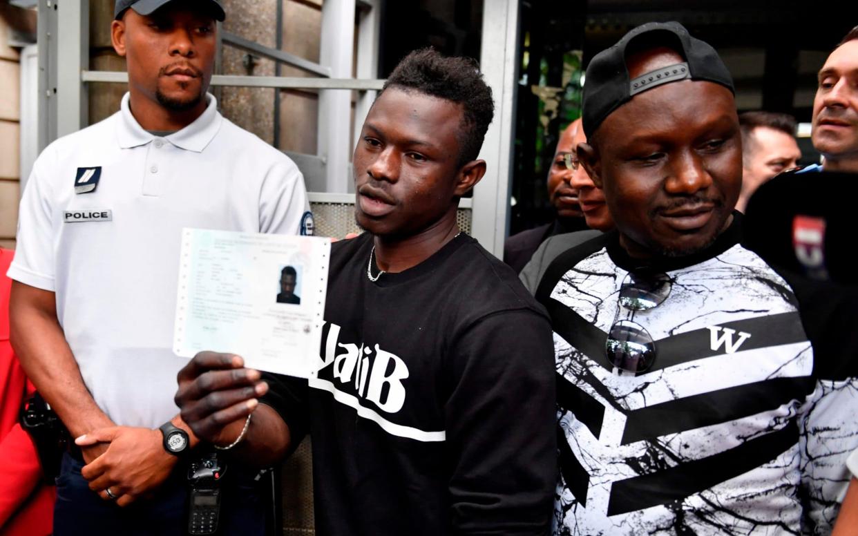 Malian migrant Mamoudou Gassama has received thanks from the family of the boy he rescued - AFP