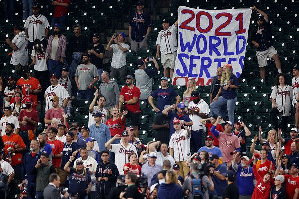 HOUSTON, TEXAS - NOVEMBER 02:  Fans celebrate the Atlanta Braves 7-0 victory against the Houston Astros in Game Six to win the 2021 World Series at Minute Maid Park on November 02, 2021 in Houston, Texas. (Photo by Tom Pennington/Getty Images)