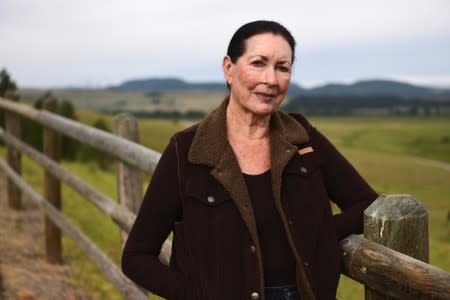 Cattle rancher Arlene Mackay poses at her ranch in Avon