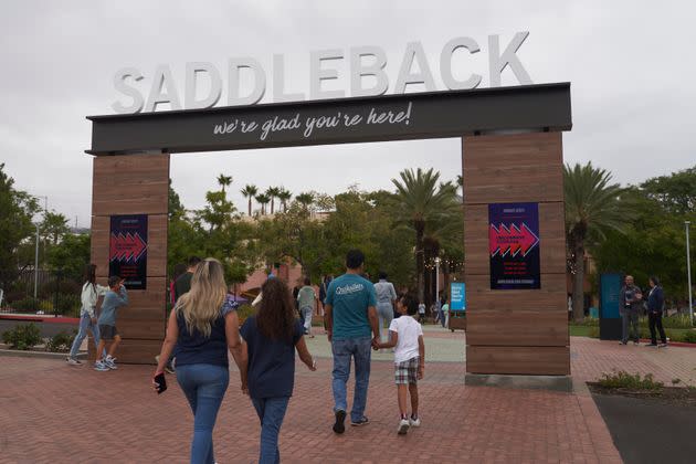 FILE - Congregants arrive at Saddleback Church in Lake Forest, Calif., on Sunday, Oct. 16, 2022. On Tuesday, Feb. 21, 2023, the Southern Baptist Convention ousted its second-largest congregation — Saddleback Church, the renowned California megachurch founded by pastor and best-selling author Rick Warren — for having a woman pastor. (AP Photo/Allison Dinner, File)