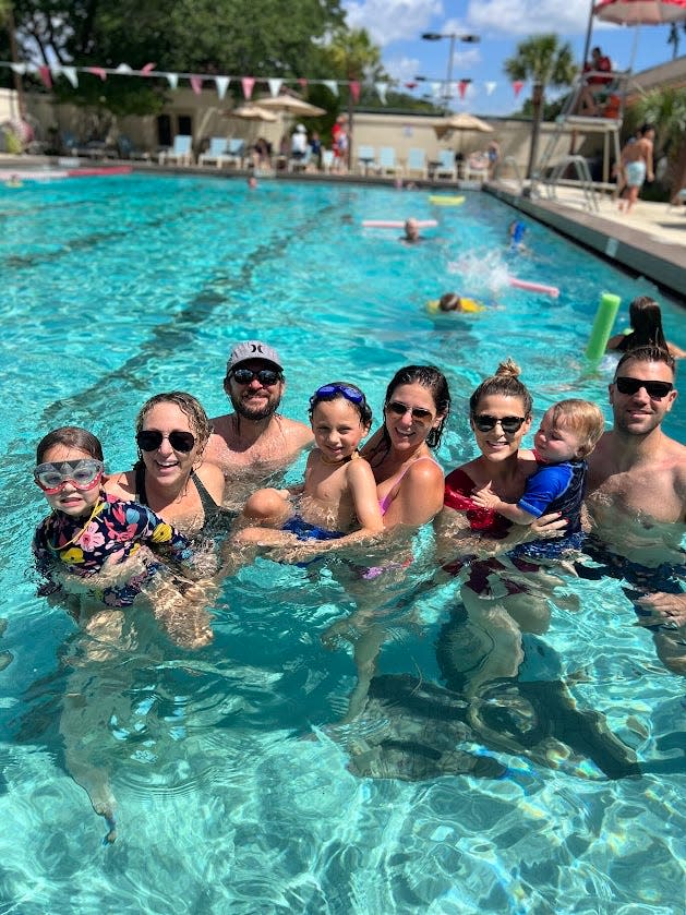Andrea Smithers is a third-generation Jewish Community Alliance member. At a JCA pool party are, from left, Smithers and daughter Charlotte, husband Ben Smithers, son Benji, sisters Molly Seebol and Stephanie Lesso, nephew Henry Lesso and brother-in-law Greg Lesso.