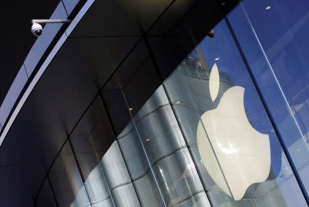 A surveillance camera is seen outside an Apple store in Beijing, China December 12, 2018. REUTERS/Jason Lee