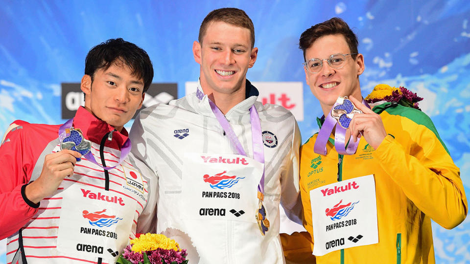 Mitchell Larkin poses on the podium of the 100m backstroke men final of the Pan Pacific Swimming Championships 2018 in Tokyo. Pic: Getty