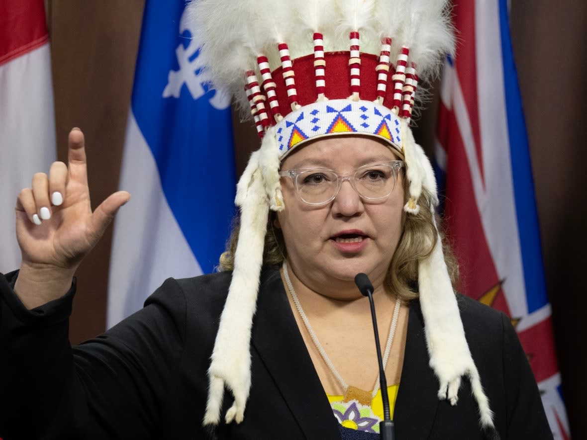 National Chief of the Assembly of First Nations Cindy Woodhouse Nepinak speaks about the federal budget during a news conference on Parliament Hill on April 17. Her headdress was briefly taken from her during an Air Canada flight Wednesday. (Adrian Wyld/The Canadian Press - image credit)