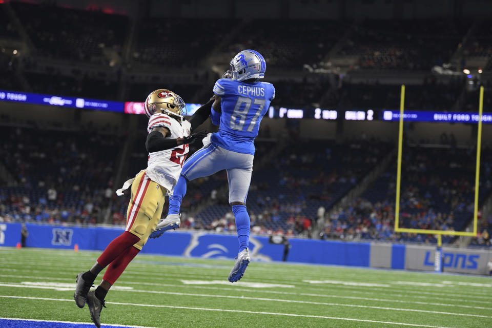 Detroit Lions wide receiver Quintez Cephus (87) catches a touchdown pass as San Francisco 49ers defensive back Dontae Johnson defends in the second half of an NFL football game in Detroit, Sunday, Sept. 12, 2021. (AP Photo/Lon Horwedel)