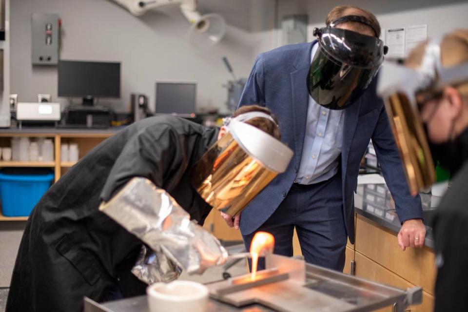 John Mauro oversees a glass melting experiment in his lab.