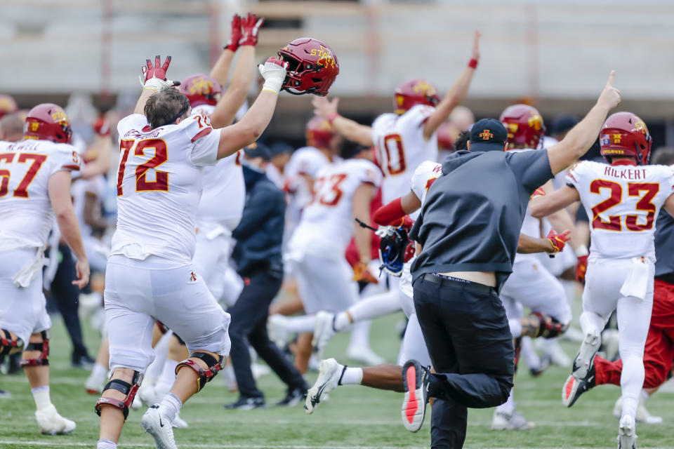 Iowa State Cyclones players and coaches run onto the field after the tying field goal was missed by the Texas Longhorns. (Photo by Matthew Pearce/Icon Sportswire via Getty Images)