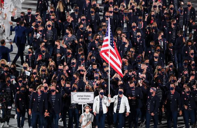 Team USA flagbearers Sue Bird and Eddy Alvares. (Photo: Stephen McCarthy via Getty Images)