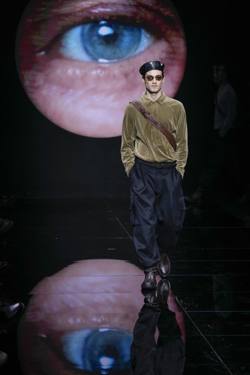 A model wears a creation part of the men's Giorgio Armani Fall-Winter 2024-2025 collection, that was presented in Milan, Italy, Sunday, Jan. 14, 2024. (AP Photo/Antonio Calanni).