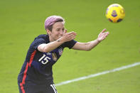 United States forward Megan Rapinoe (15) acknowledges fans in the stands after scoring a goal during the second half of a SheBelieves Cup women's soccer match against Brazil, Sunday, Feb. 21, 2021, in Orlando, Fla. (AP Photo/Phelan M. Ebenhack)