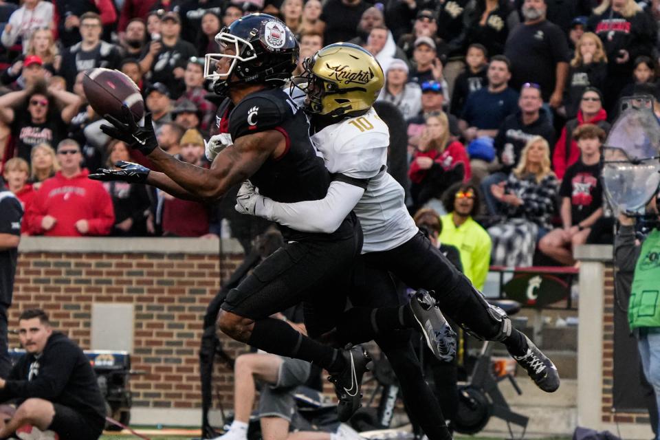 UC's wide receiver Braden Smith catches a long pass during the UC vs. UCF game at Nippert Stadium on Saturday November 4, 2023. UCF won the game with a final score of 28-26.