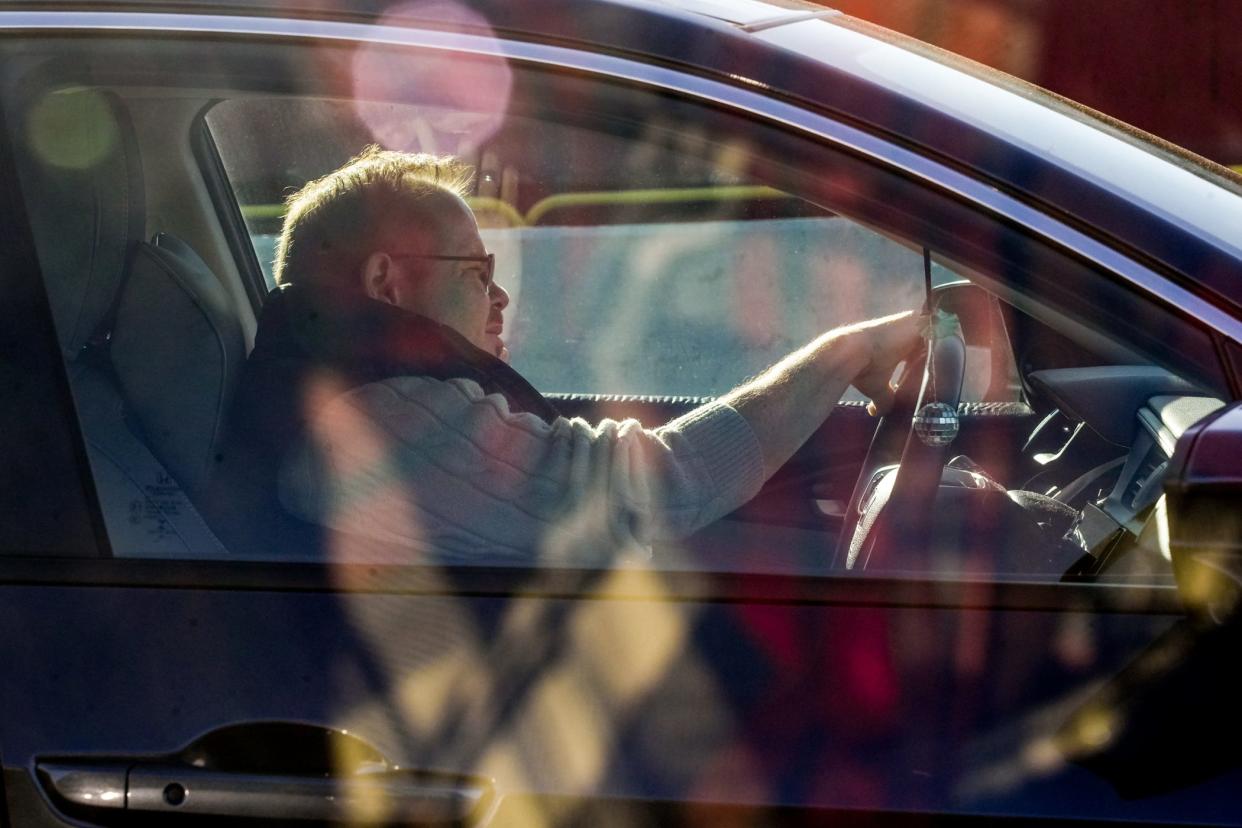 Drivers jockey for position merging onto Henderson Bridge during the morning commute on Tuesday.