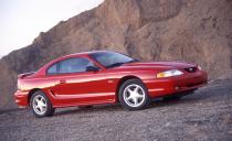 <p>Now that the year-old redesign of the Ford Mustang has some miles on it, both Ford and the Mustang’s obsessed clientele are ready for a few important changes. A Mustang Cobra making more than 300 horsepower is certainly welcome. And finally banished from the ’96 Mustang GT is the ancient overhead-valve 4.9-liter V-8, which—in various guises—has powered Mustangs since their inception. Certain purists may wail and gnash their teeth over this one, but it’s a transition we like. </p><p><a class="link " href="https://www.caranddriver.com/reviews/a15140405/1996-ford-mustang-gt-archived-instrumented-test-review/" rel="nofollow noopener" target="_blank" data-ylk="slk:FULL MUSTANG GT TEST RESULTS;elm:context_link;itc:0;sec:content-canvas">FULL MUSTANG GT TEST RESULTS</a></p>