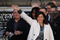 Paris mayor Anne Hidalgo arrives before delivering a speech after her victorious second round of the municipal election, Sunday, June 28, 2020 in Paris. France on Sunday held the second round of municipal elections that has seen a record low turnout amid concerns over the coronavirus outbreak and anger at how President Emmanuel Macron's government handled it. (AP Photo/Christophe Ena)