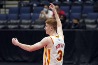 Atlanta Hawks guard Kevin Huerter (3) celebrates his shot at the buzzer during the first half of an NBA basketball game against the Toronto Raptors Tuesday, April 13, 2021, in Tampa, Fla. (AP Photo/Chris O'Meara)