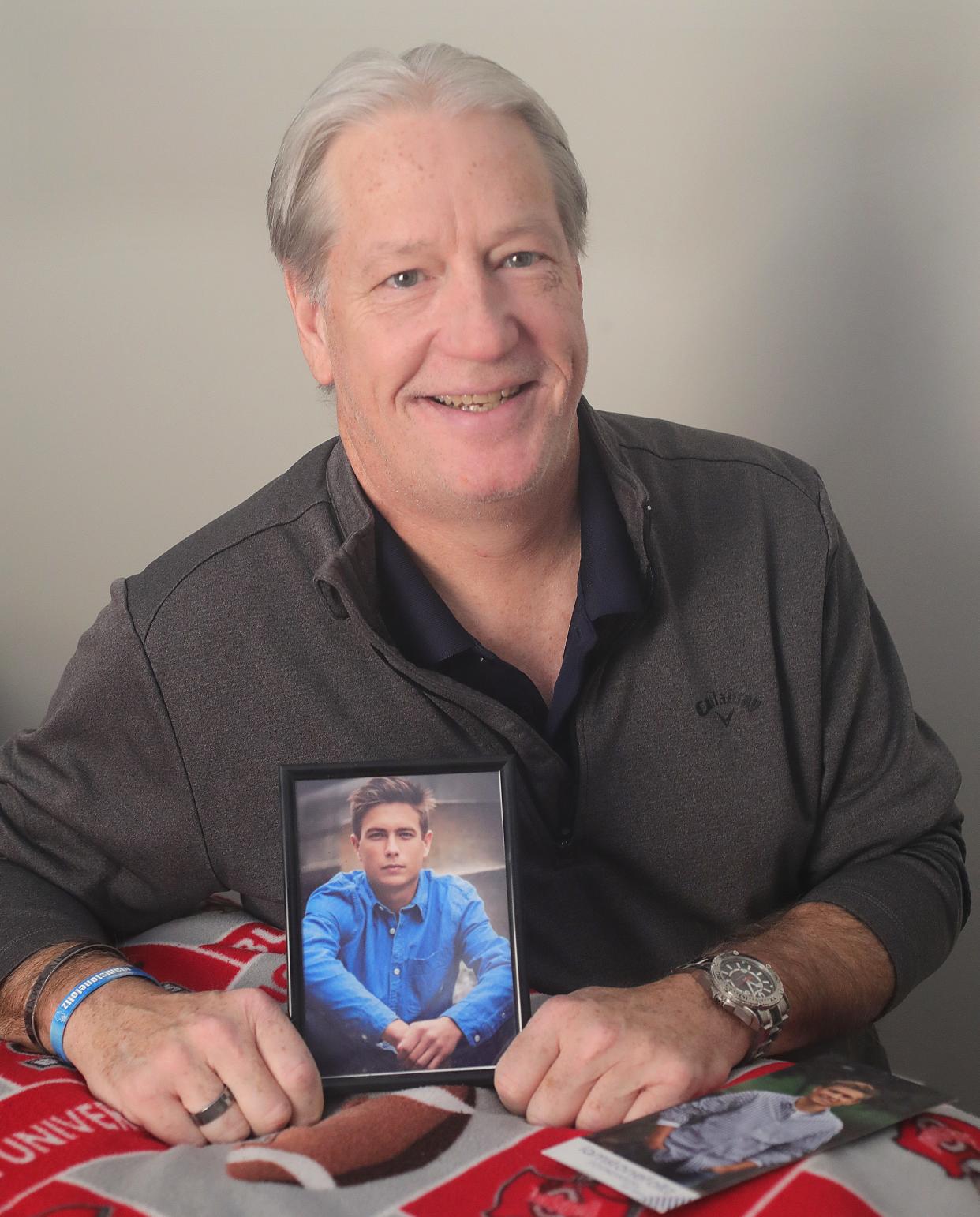 Scott Herold of Wadsworth keeps this photo of Stone Foltz at his bedside. Herold received Foltz’s liver after he died in a hazing incident at Bowling Green State University in 2021.