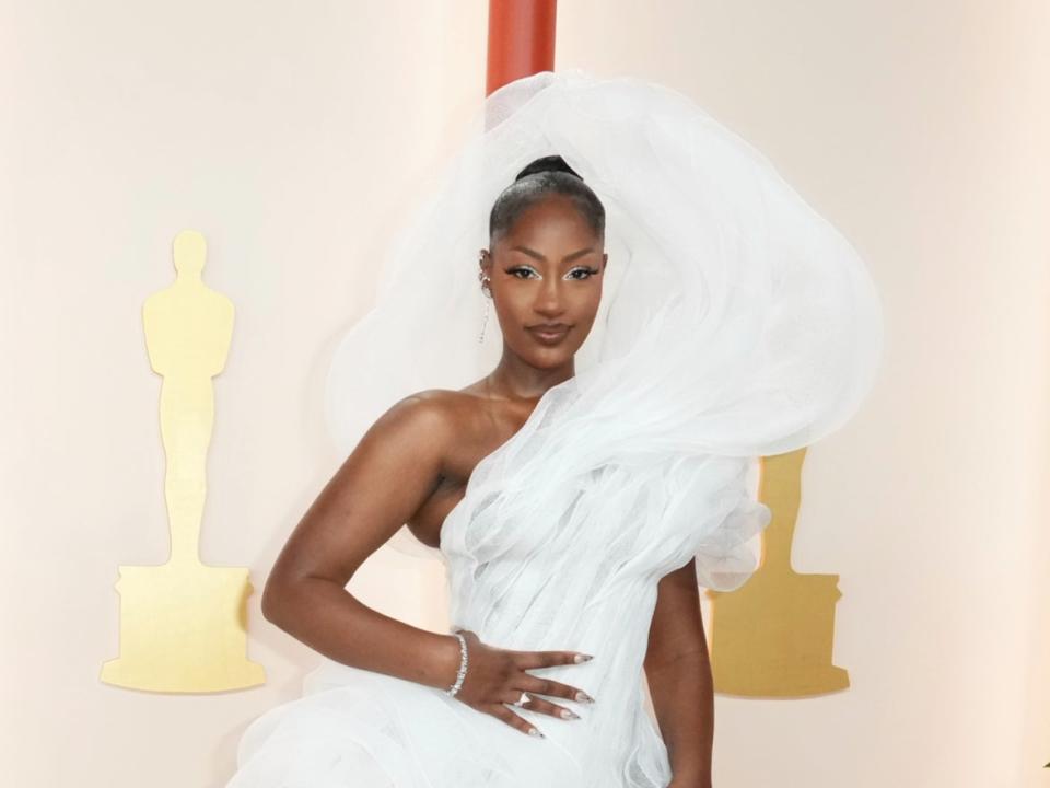 Tems on the Academy Awards red carpet (Jordan Strauss/Invision/AP)