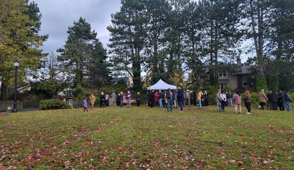 People chat in Fouts Park in Bellingham after the ribbon-cutting ceremony and dedication event on Sunday, Nov. 6, for the first permanent Black Lives Matter memorial in Whatcom County.