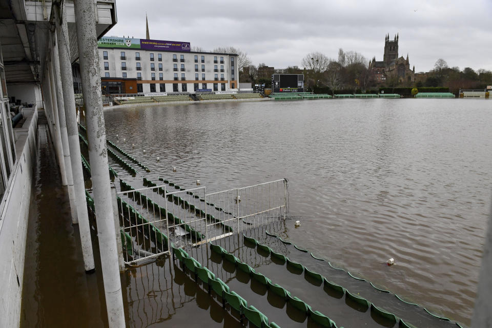 New Road Cricket Ground is flooded for the fifth time this year, as weather warnings are in place in the lead up to Christmas in Worchester, England, Thursday, Dec. 19, 2019. (Jacob King/PA via AP)