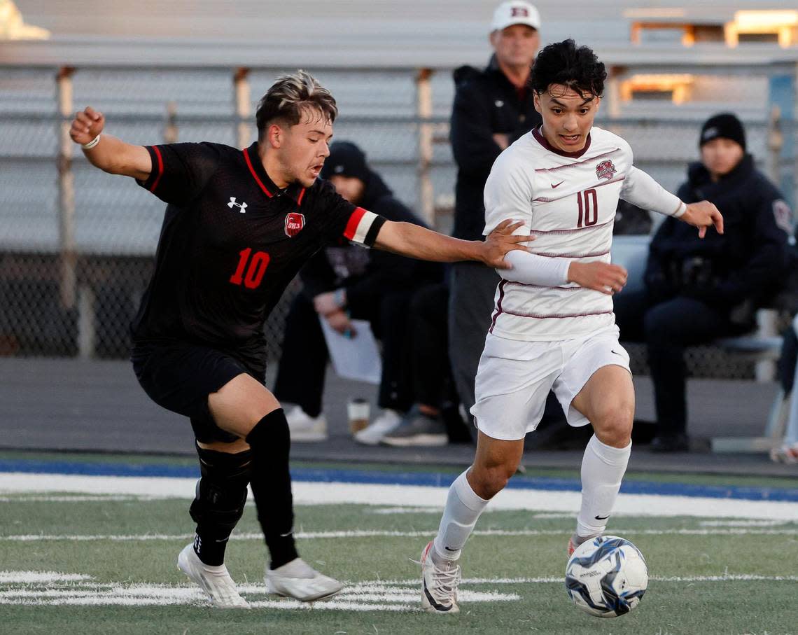 Diamond Hill-Jarvis’ Edgar Resendiz battles Bridgeport’s Daniel Aguilar for the ball during a UIL Class 4A Regional Quarterfinal soccer game at Kangaroo Stadium in Weatherford Texas, Tuesday Apr 02, 2024. Diamond Hill led 2-0 at the half. Bob Booth/Special to the Star-Telegram