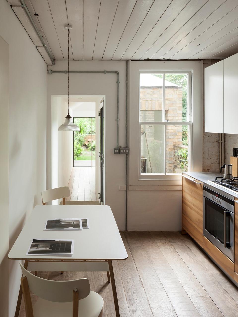 The house’s kitchen, leading on to the reception room and garden (Ståle Eriksen/Dexters)