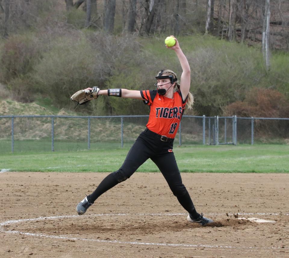 Strasburg's Amelia Spidell sets to fire a pitch against Central Catholic.