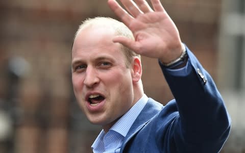 The Duke of Cambridge Waves to the crowd as he walks out of St Mary's Hospital in Paddington - Credit: Pete Maclaine/i-Images