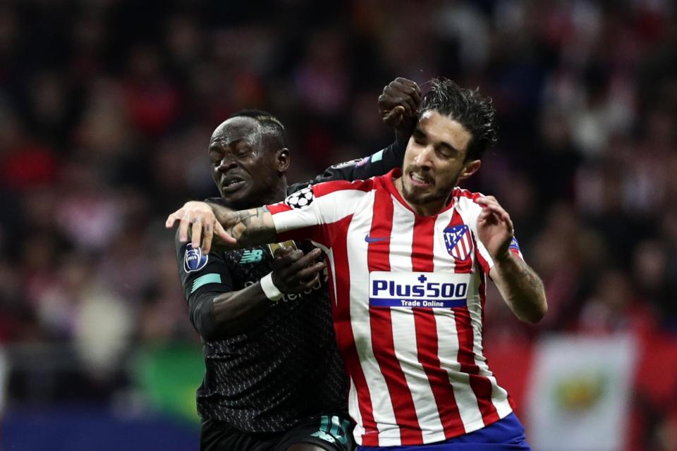 Mane tangled with Vrsaljko in the first half and Klopp was unhappy with Atletico's attempts to get him sent off  Photo: AP