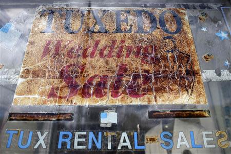 A tuxedo and wedding store that went out of business 10 years ago but still retains all of its merchandise is seen in Shamokin May 1, 2014. REUTERS/Mark Makela