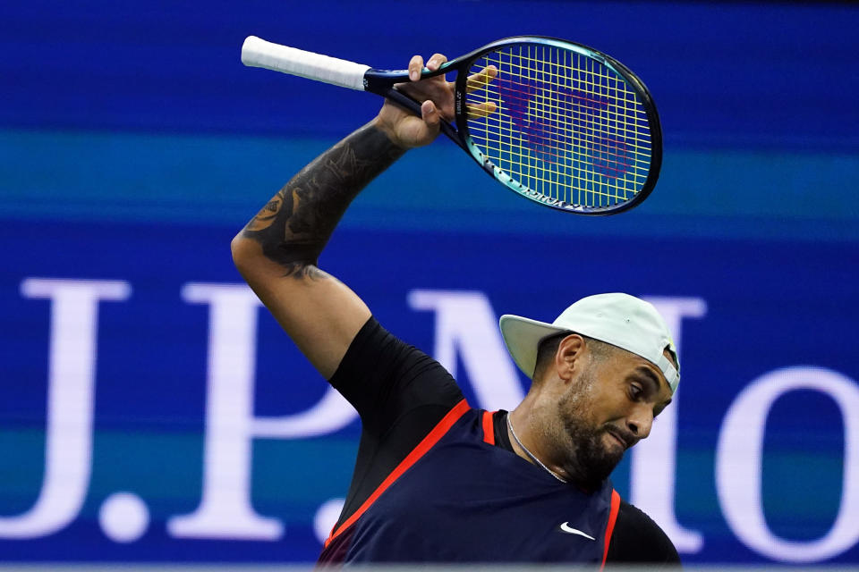 Nick Kyrgios, of Australia, tosses his racket as he plays Karen Khachanov, of Russia, during the quarterfinals of the U.S. Open tennis championships, Tuesday, Sept. 6, 2022, in New York. (AP Photo/Frank Franklin II)