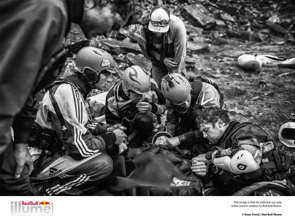 Spirit: Dean Treml, New Zealand for his image showing kayaker Josh Neilson being supported by fellow paddlers Barnaby Prees, Sam Sutton, Tim Pickering, Ben Brown, Jamie Sutton and Jaren Seiler after a bad landing off Matze’s Drop, Storulfossen, Norway. (© Dean Treml / Red Bull Illume)