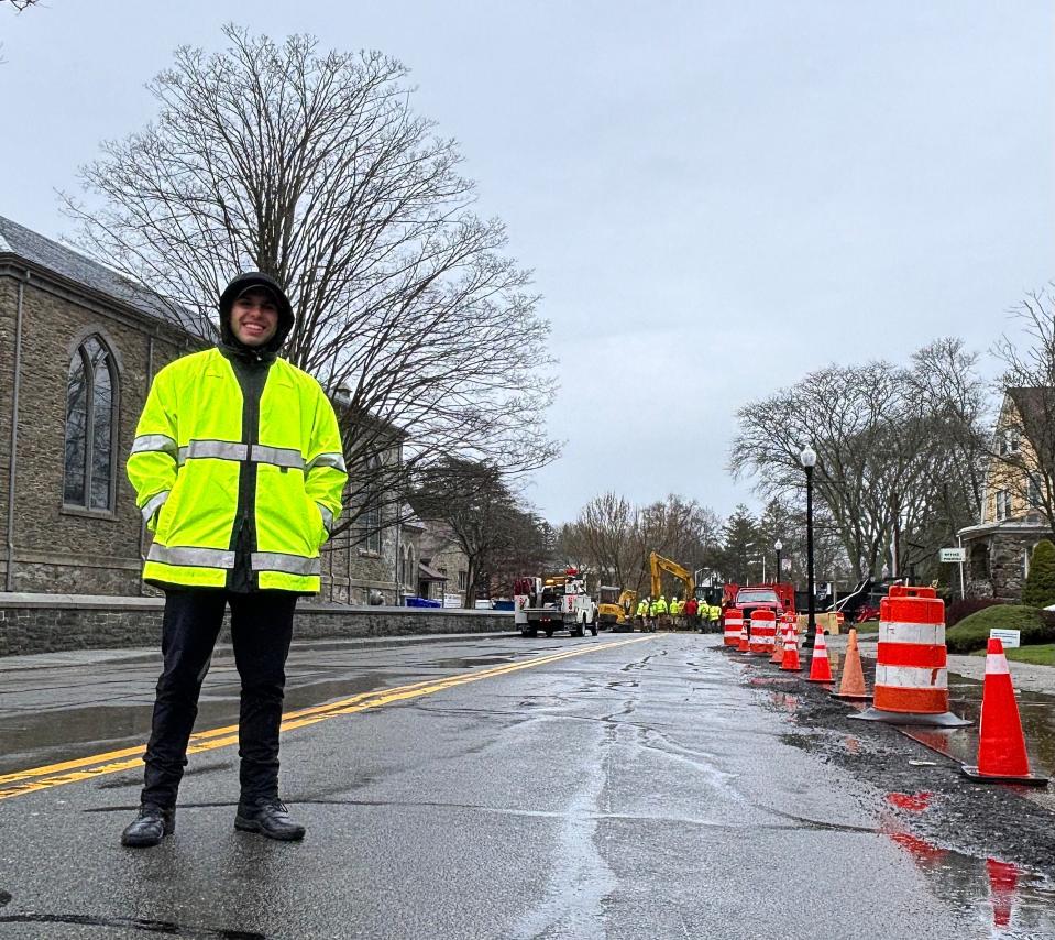Taunton firefighter Tyler Tehan is seen here on April 4 working as a traffic control officer at Church Green.