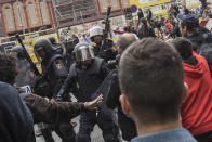 <p>Police and civilians clash in the streets of Catalonia on the day of the referendum. (Getty) </p>