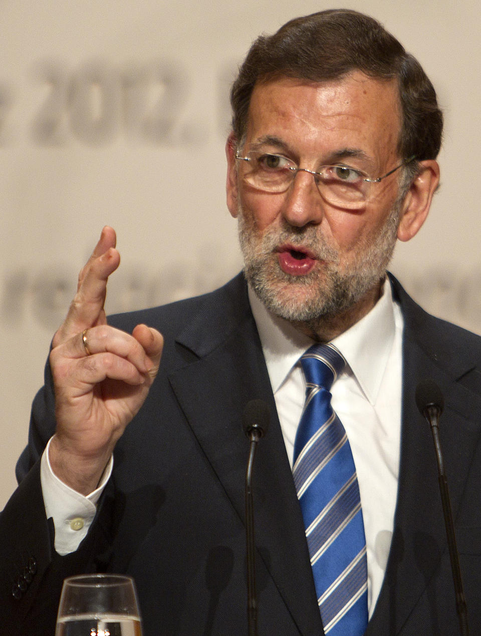 Spain's Prime Minister Mariano Rajoy, gestures during a press conference at the XXII Iberoamerican summit in the southern Spanish city of Cadiz, Saturday, Nov. 17, 2012. In an historic role reversal, recession-hit Spain and Portugal on Friday courted the Latin American leaders of their former colonies, countries that now enjoy some of the strongest economic growth in the world. Spain's King Juan Carlos opened the annual Iberoamerican summit, which brings together the heads of Spain and Portugal and the leaders of Latin America to discuss political issues and arrange business deals. (AP Photo/Miguel Angel Morenatti)