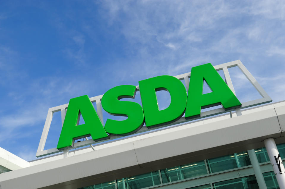 Birmingham, England - March 14, 2011: Asda sign on storefront. Asda is a British supermarket chain which retails food, clothing, toys and general merchandise. Asda became a subsidiary of the American retail giant Wal-Mart, the world\'s largest retailer in 1999.