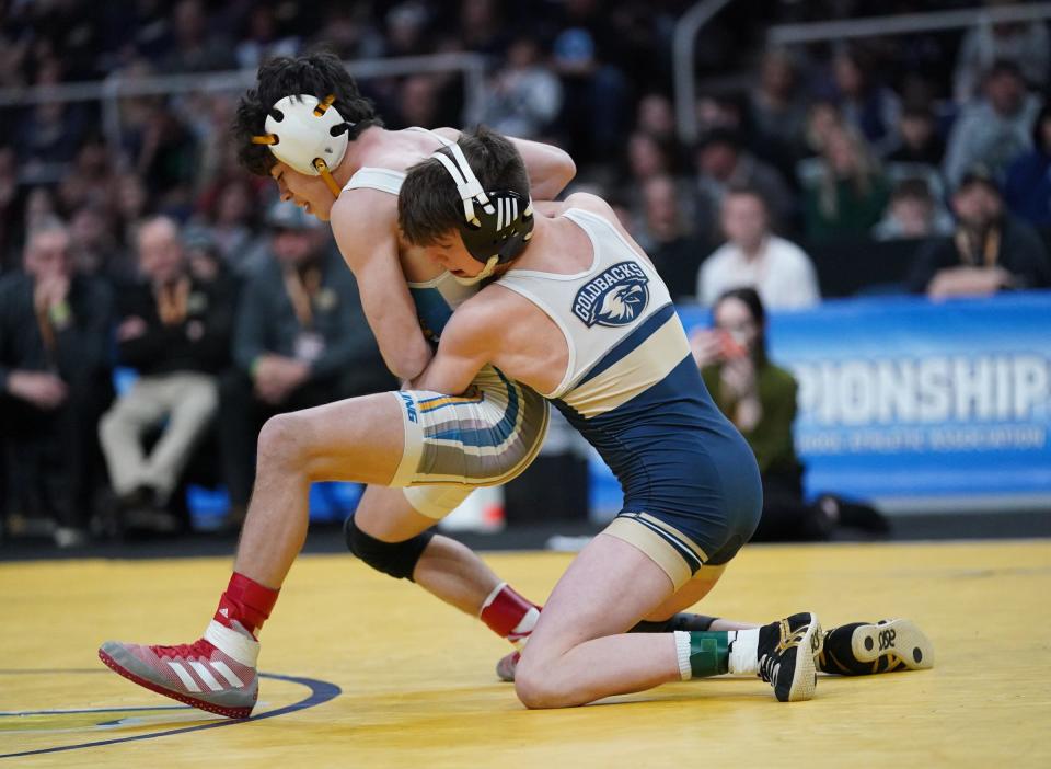 Newburgh Free Academy's Cooper Merli wrestles Connor Sheridan of Hauppauge in the Division 1 102-pound championship match at the NYSPHSAA Wrestling Championships at MVP Arena in Albany, on Saturday, February 25, 2023.