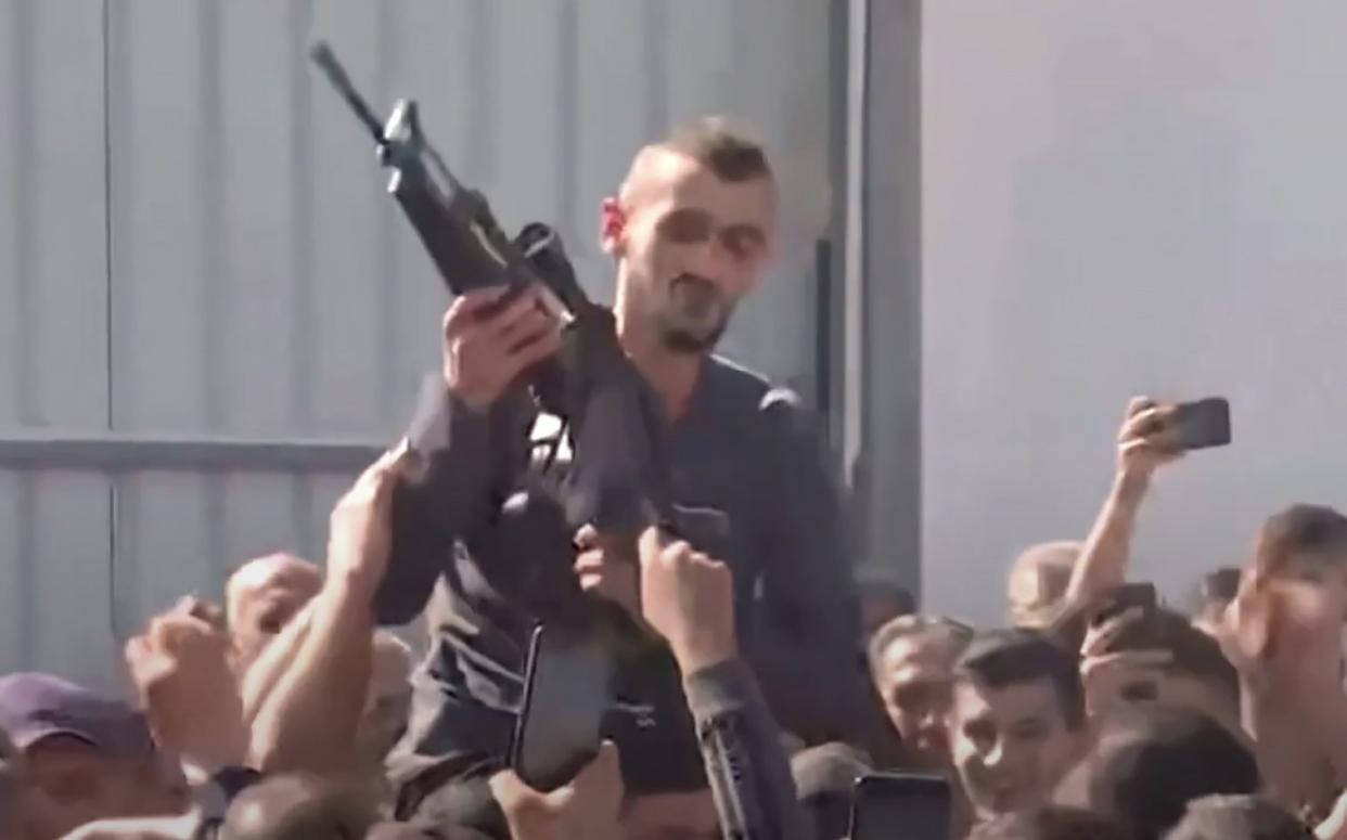 Muhhamad Jabber was seen being lifted onto the shoulders of supporters during a Palestinian funeral in May