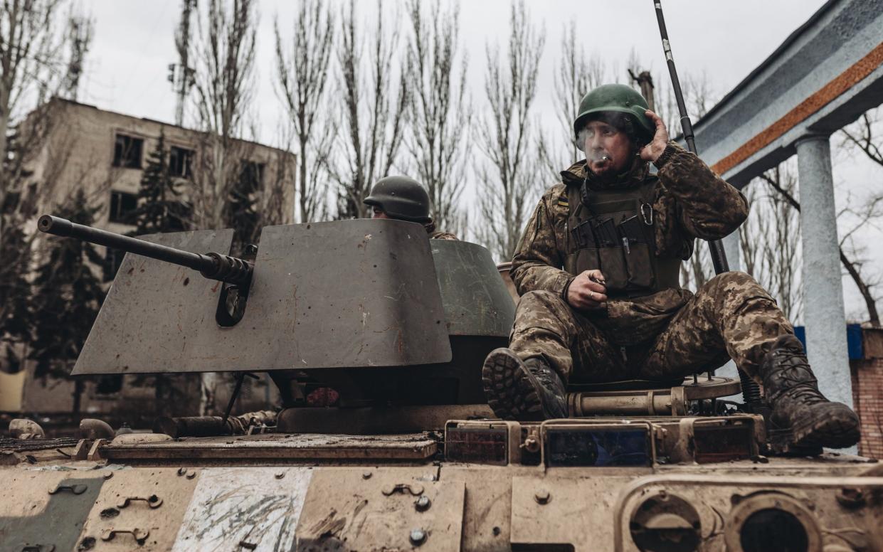 Ukrainian soldiers on an armoured military vehicle in Chasiv Yar, near Bakhmut in eastern Ukraine - Anadolu Agency/Anadolu Agency via Getty Images