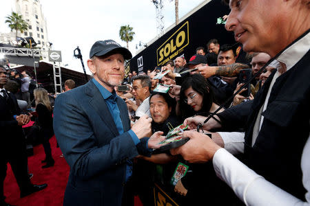 FILE PHOTO: Director of the movie Ron Howard signs autographs at the premiere for the movie "Solo: A Star Wars Story" in Los Angeles, California, U.S., May 10, 2018. REUTERS/Mario Anzuoni/File Photo