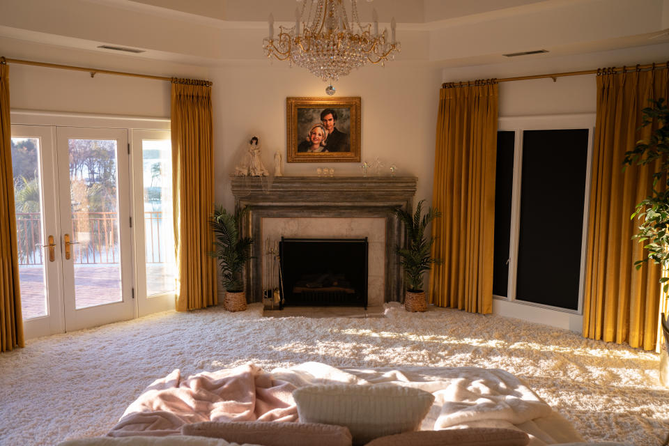 Tammy Faye’s bedroom, where production designer Laura Fox placed the master bed in the center of the room - Credit: Daniel McFadden