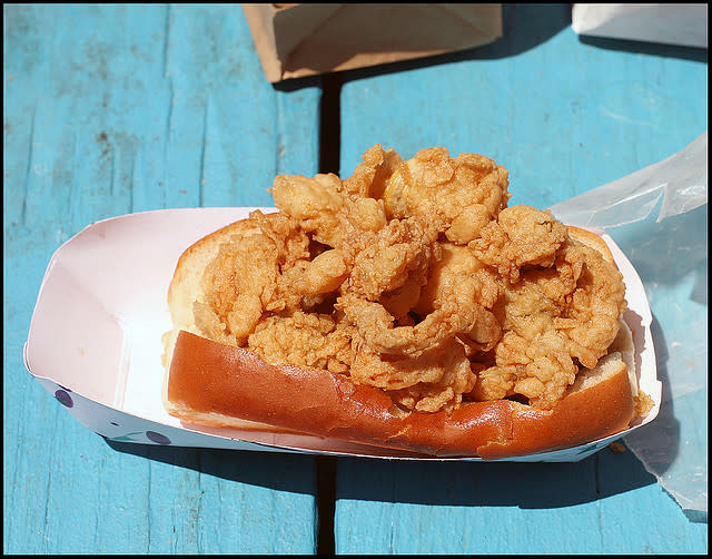 <b>Rhode Island: Fried Clam Roll</b> Crispy fried clams make this sandwich from Flo's Clam Shack an indulgent summer treat.<br> <br> (Image courtesy <a href="http://www.flickr.com/photos/gothambill/3738219557/" rel="nofollow noopener" target="_blank" data-ylk="slk:Gothambill/Flickr;elm:context_link;itc:0;sec:content-canvas" class="link ">Gothambill/Flickr</a>)