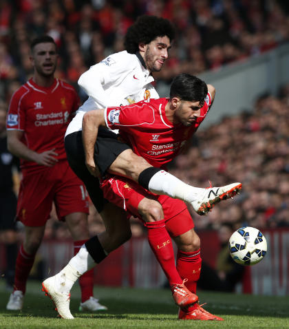 Football - Liverpool v Manchester United - Barclays Premier League - Anfield - 22/3/15 Manchester United&#39;s Marouane Fellaini in action with Liverpool&#39;s Emre Can Reuters / Phil Noble Livepic EDITORIAL USE ONLY. No use with unauthorized audio, video, data, fixture lists, club/league logos or &quot;live&quot; services. Online in-match use limited to 45 images, no video emulation. No use in betting, games or single club/league/player publications. Please contact your account representative for further details.