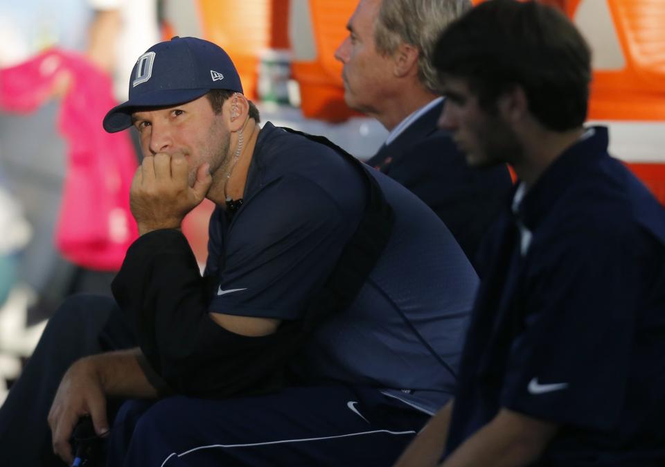 Tony Romo is mulling his future. (AP)